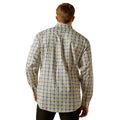Man wearing a patterned shirt on a white background