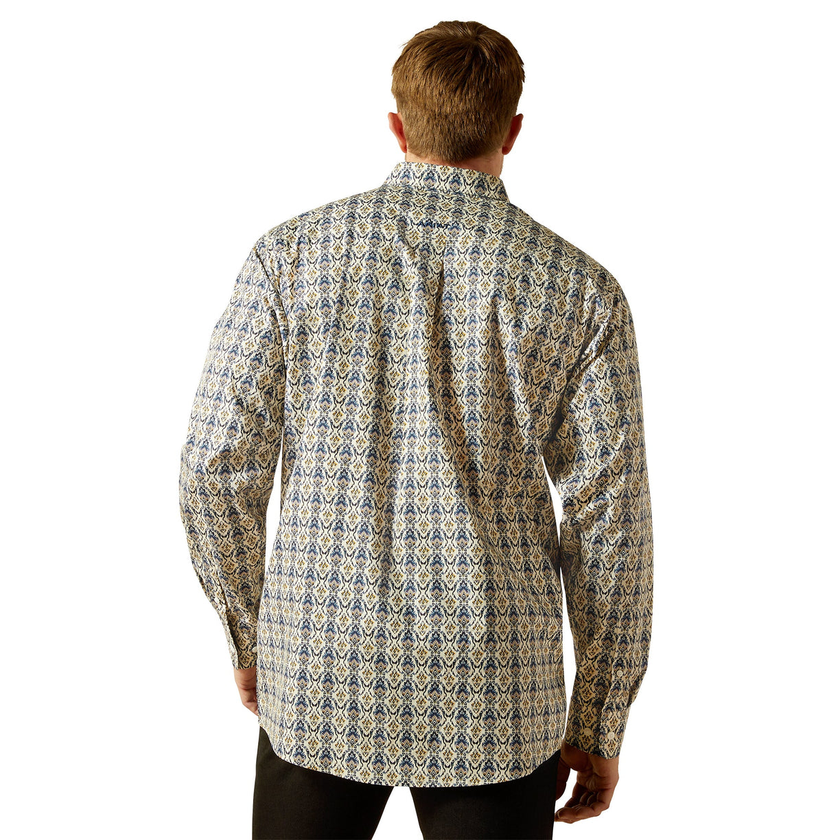 Man wearing a patterned shirt on a white background
