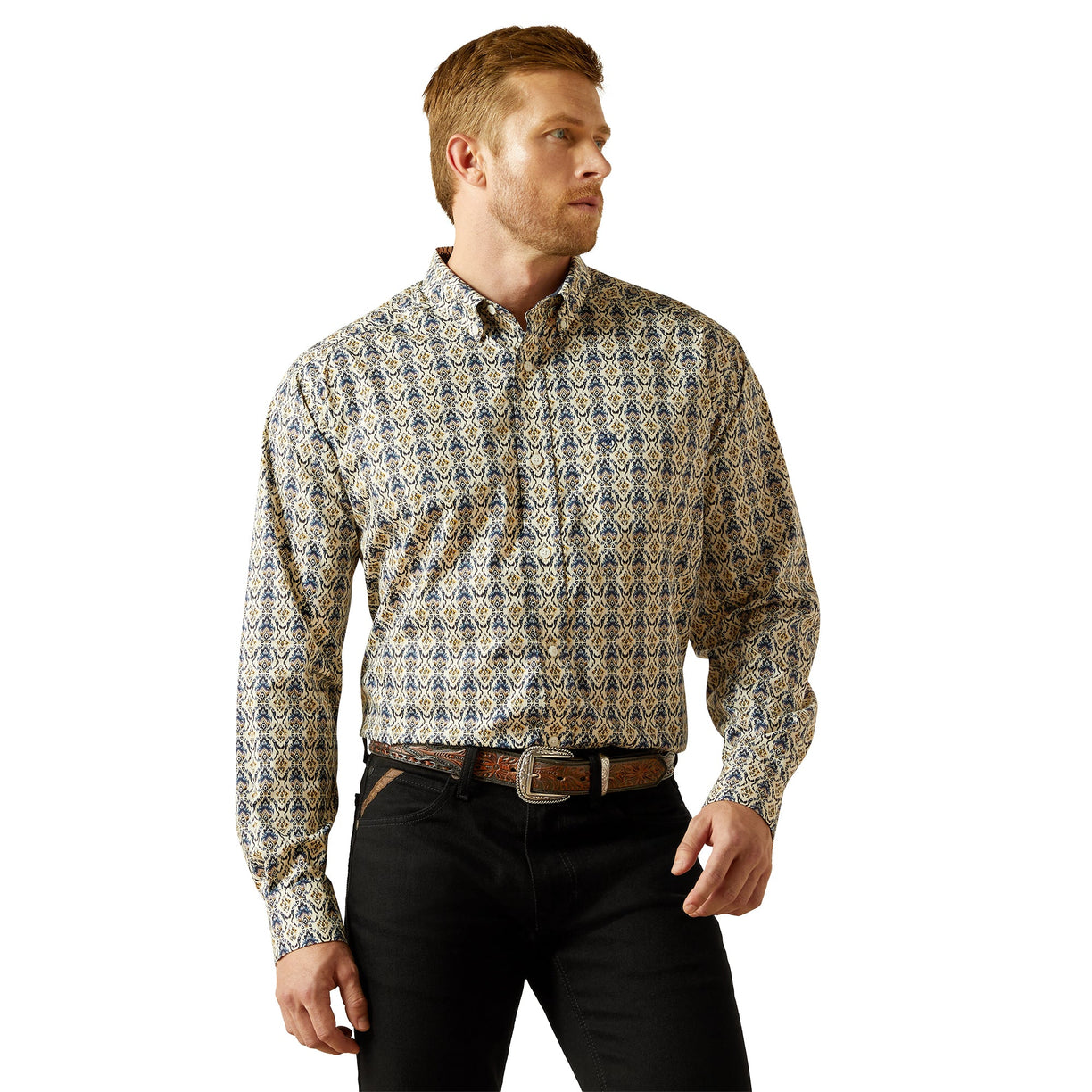 Man wearing a patterned shirt and black pants on a white background