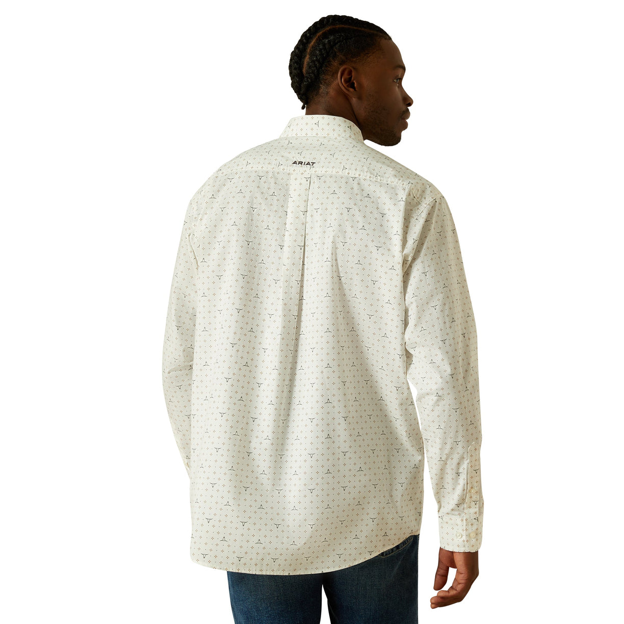 Person wearing a patterned long-sleeve shirt with a visible brand logo on a white background