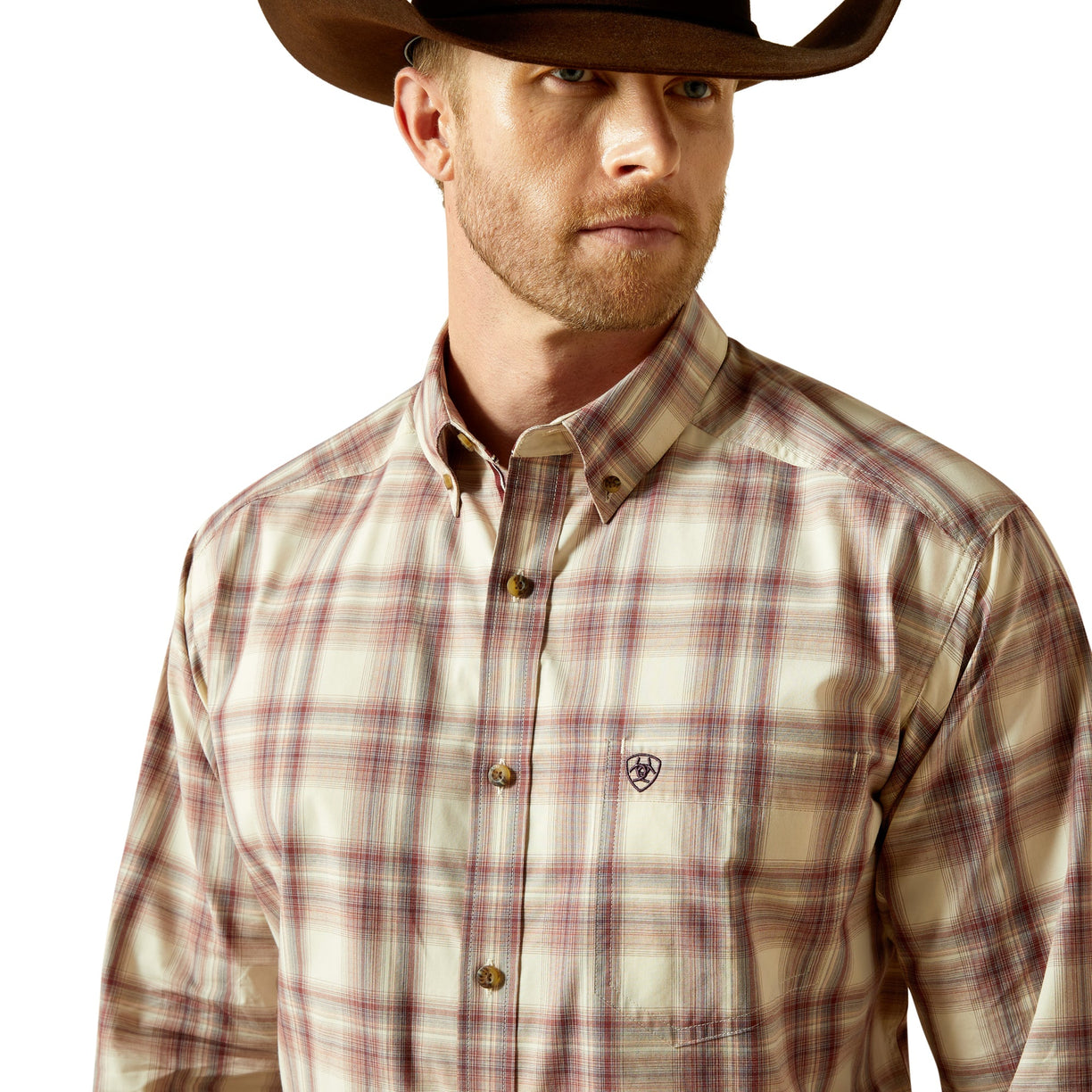Man wearing a plaid shirt and cowboy hat on a white background