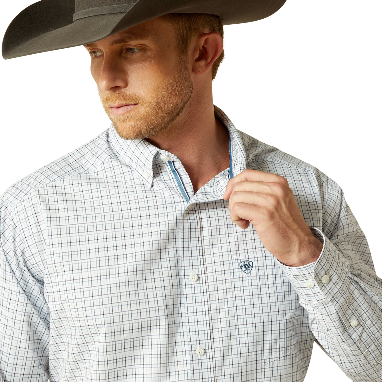 Man wearing a checkered shirt and cowboy hat on a white background
