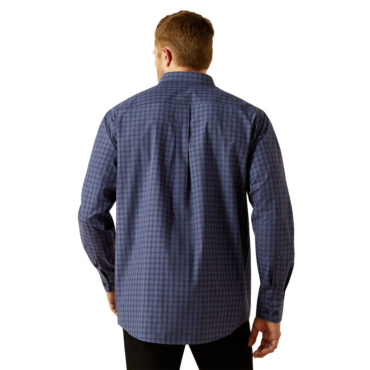 Man wearing a blue plaid shirt on a white background