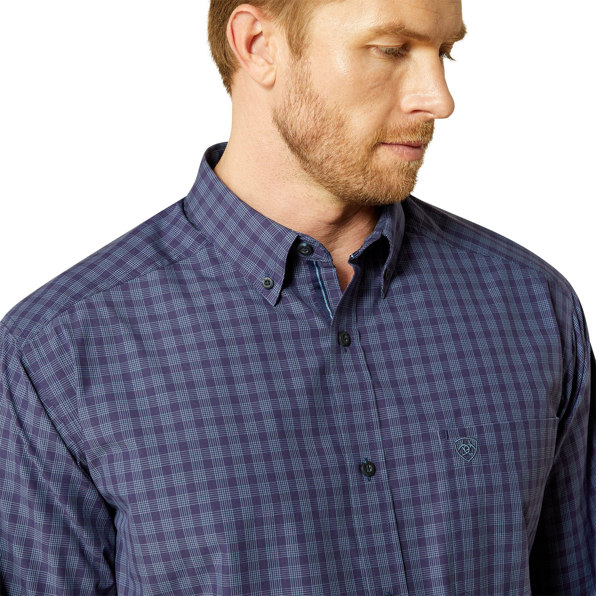 Man wearing a blue checkered shirt on a white background
