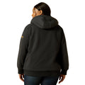 Person wearing a black hoodie with a brand logo on the back, standing against a white background