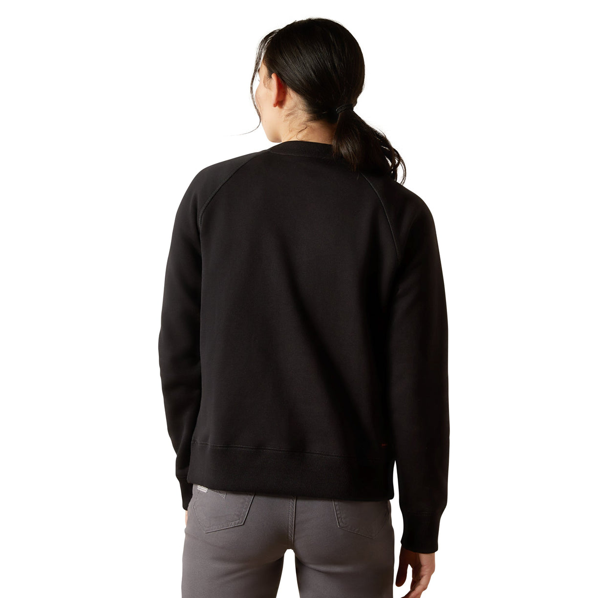 Person wearing a black sweatshirt on a white background