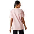 Woman wearing a light pink t-shirt on a white background