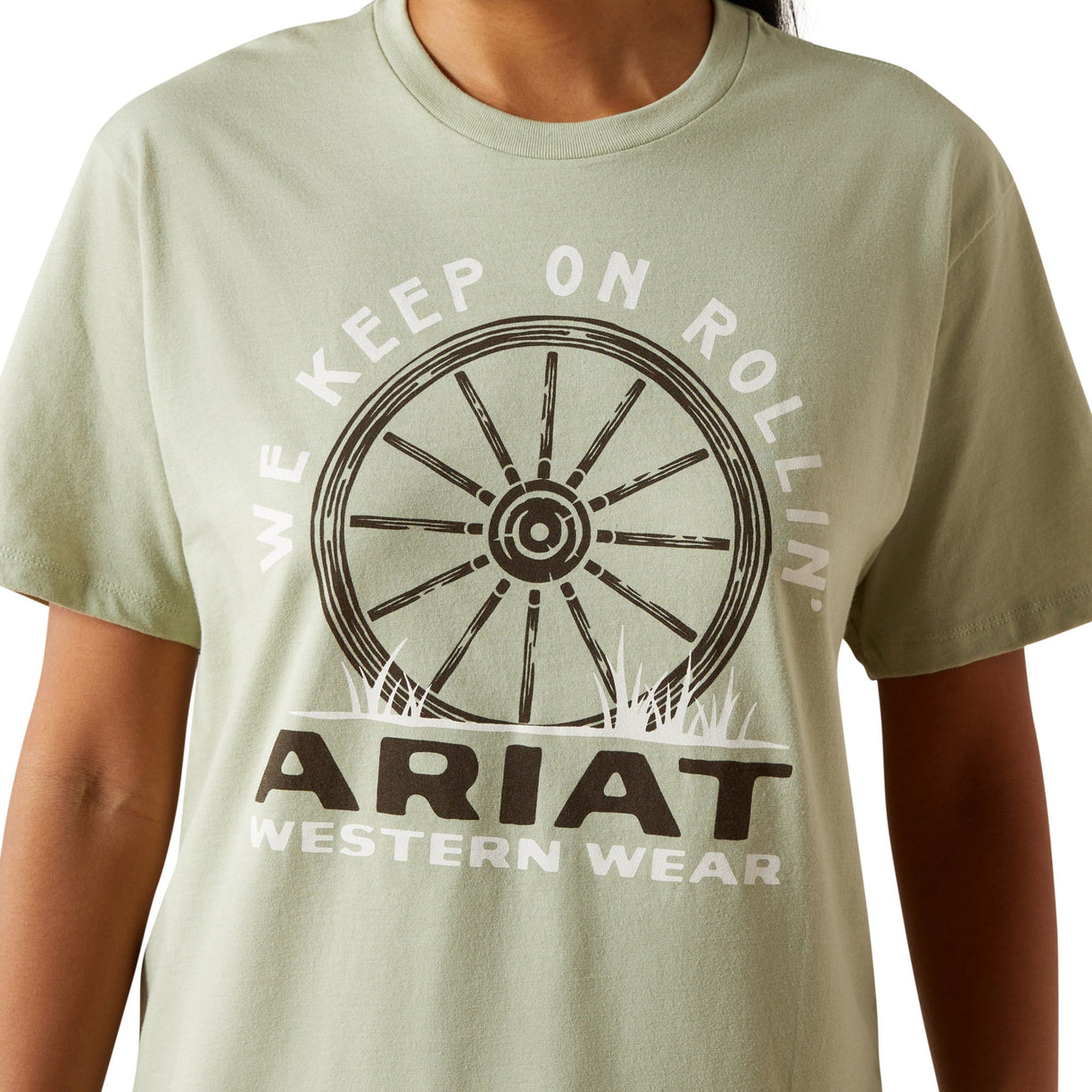 Light green t-shirt with Ariat logo and text on a white background