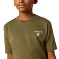 Person wearing a green Ariat t-shirt on a white background