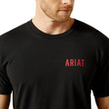 Black t-shirt with red 'ARIAT' logo worn by a person on a white background