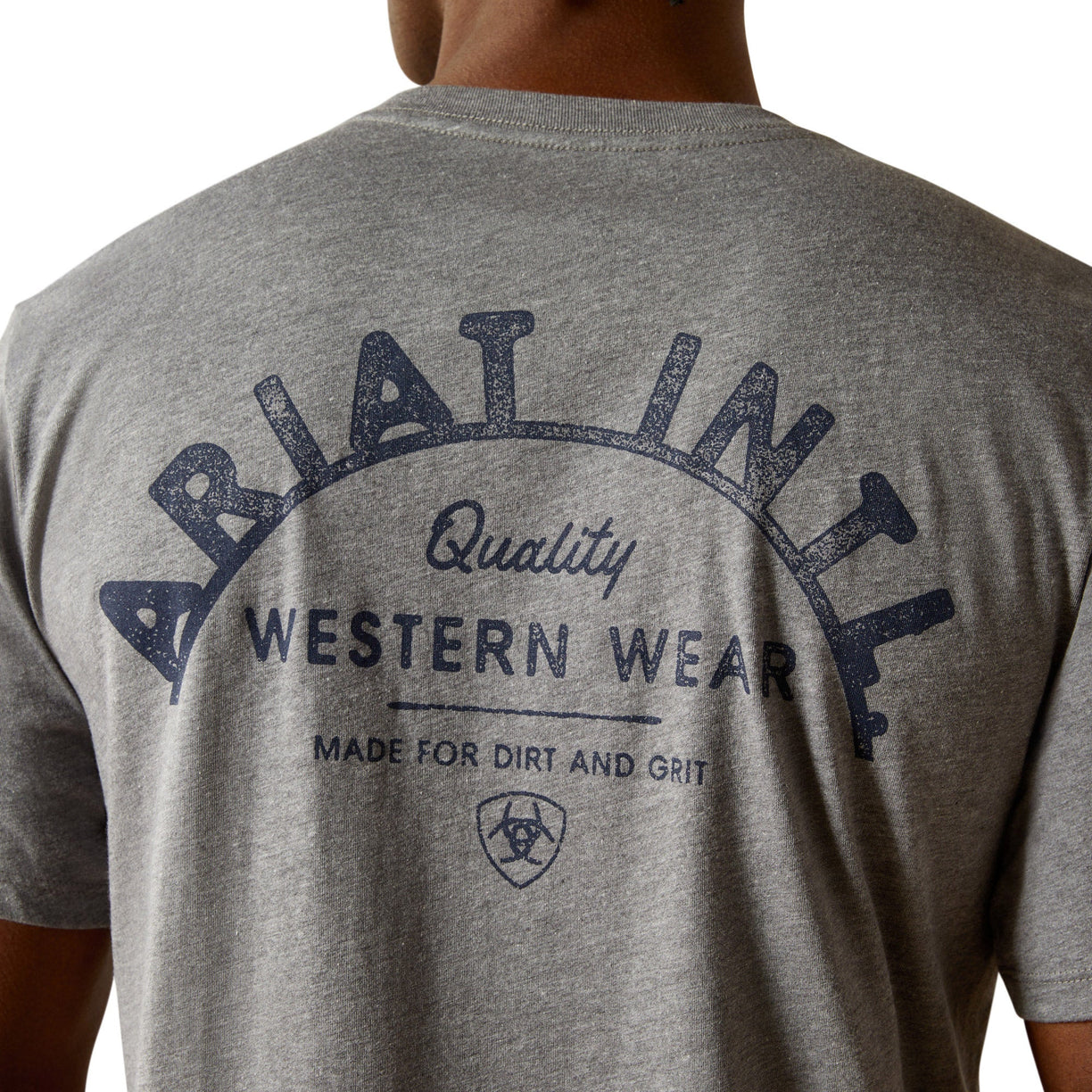 Gray t-shirt with 'Ariat' branding on the back, featuring text about western wear.