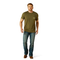 Man wearing a green t-shirt and blue jeans on a white background