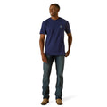 Man wearing a navy blue t-shirt and jeans on a white background