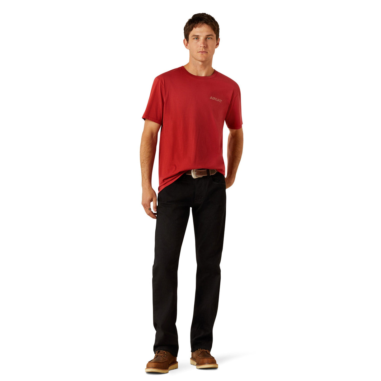 Man wearing a red t-shirt and black pants on a white background