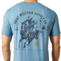 Blue t-shirt with a graphic of a cowboy on a horse and 'Ariat Western Supply Co.' text.