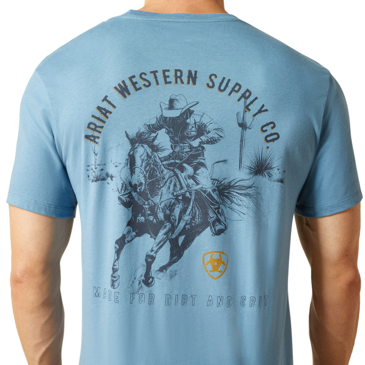 Blue t-shirt with a graphic of a cowboy on a horse and 'Ariat Western Supply Co.' text.