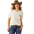 Woman wearing a cream t-shirt with a logo, blue jeans, and a brown hat on a white background