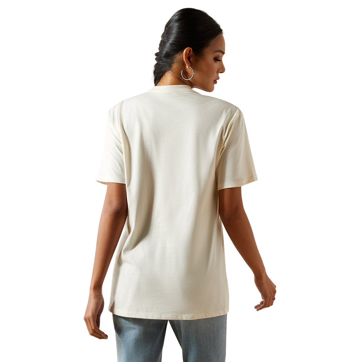 Woman wearing a beige t-shirt on a white background