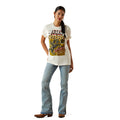 Woman wearing a graphic t-shirt and jeans on a white background
