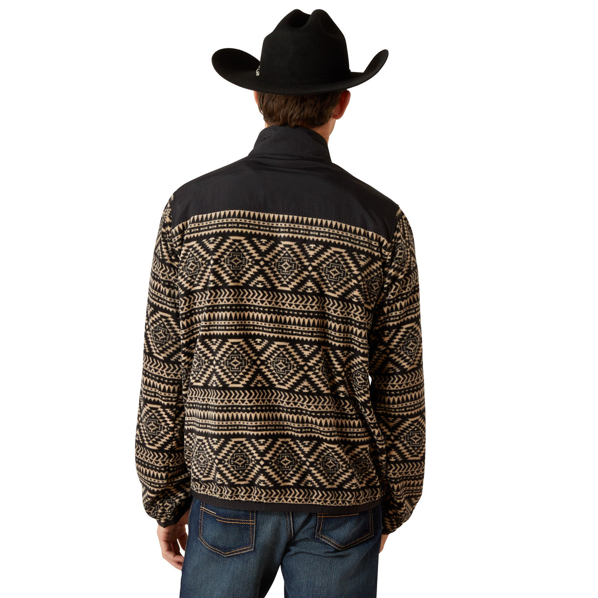 Person wearing a black and beige patterned jacket with a cowboy hat on a white background