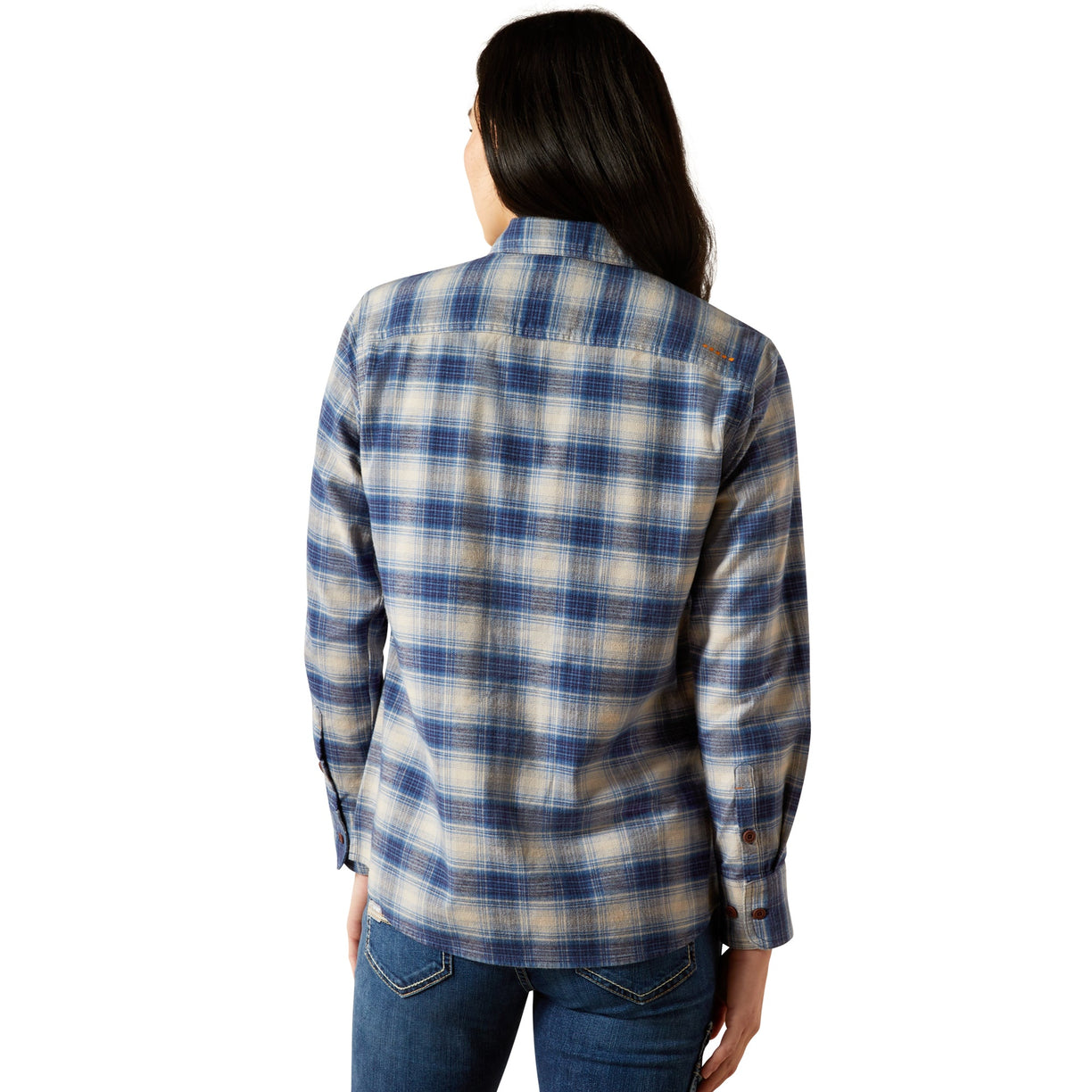 Person wearing a blue and beige plaid shirt on a white background