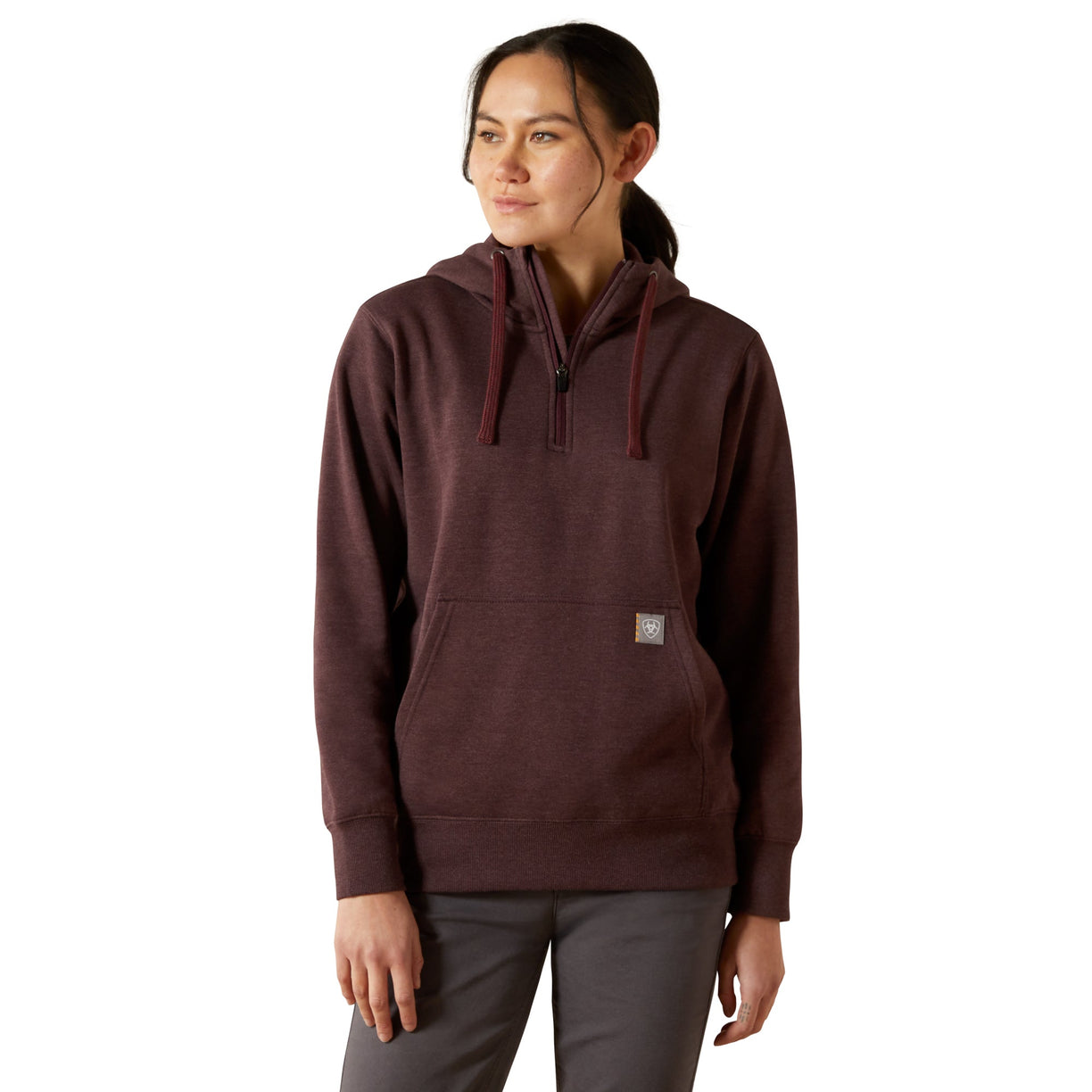 Woman wearing a brown hoodie on a white background