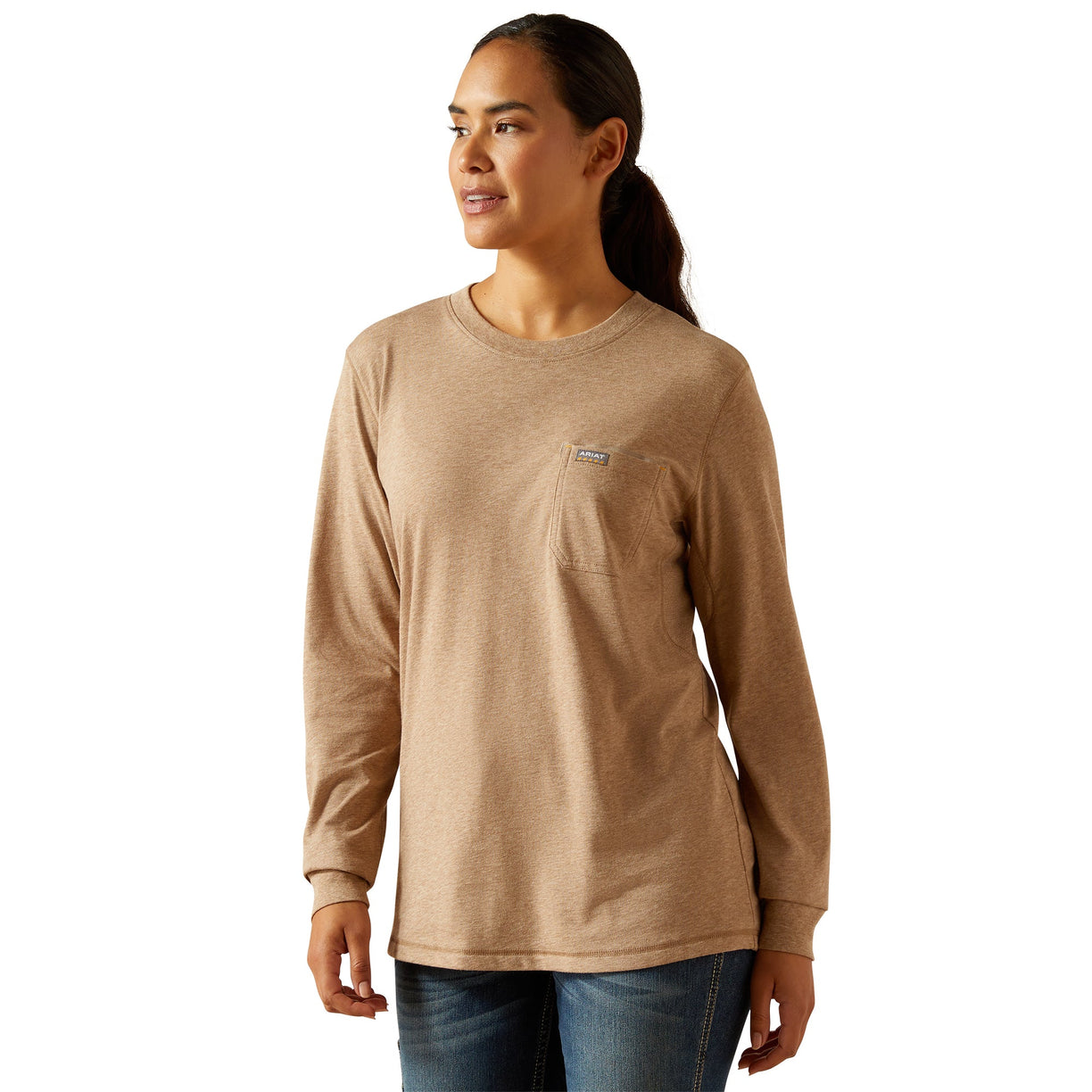 Woman wearing a beige long-sleeve shirt on a white background