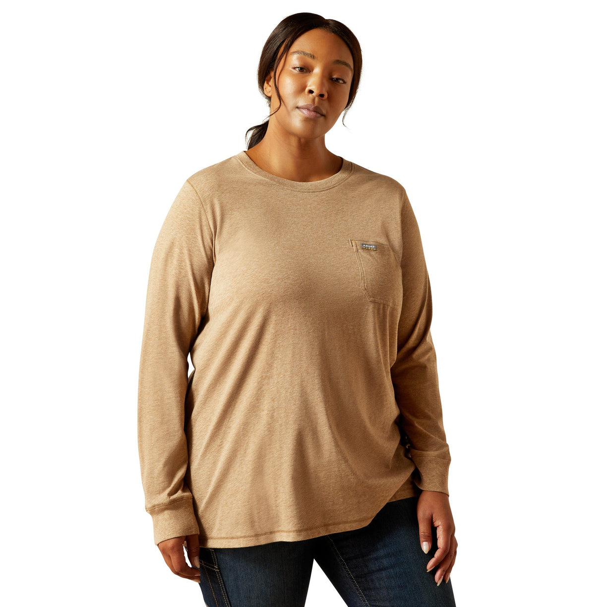 Woman wearing a beige long-sleeve shirt on a white background