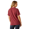 Woman wearing a red t-shirt on a white background