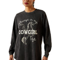 Black long-sleeve shirt with horse graphic and text worn by a person on a white background