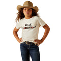 Child wearing an Ariat t-shirt with a cowboy hat and jeans on a white background