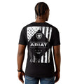 Person wearing a black t-shirt with a white graphic design and 'Ariat' branding on the back.