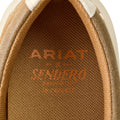 Close-up of Ariat Sendero logo on brown textured material
