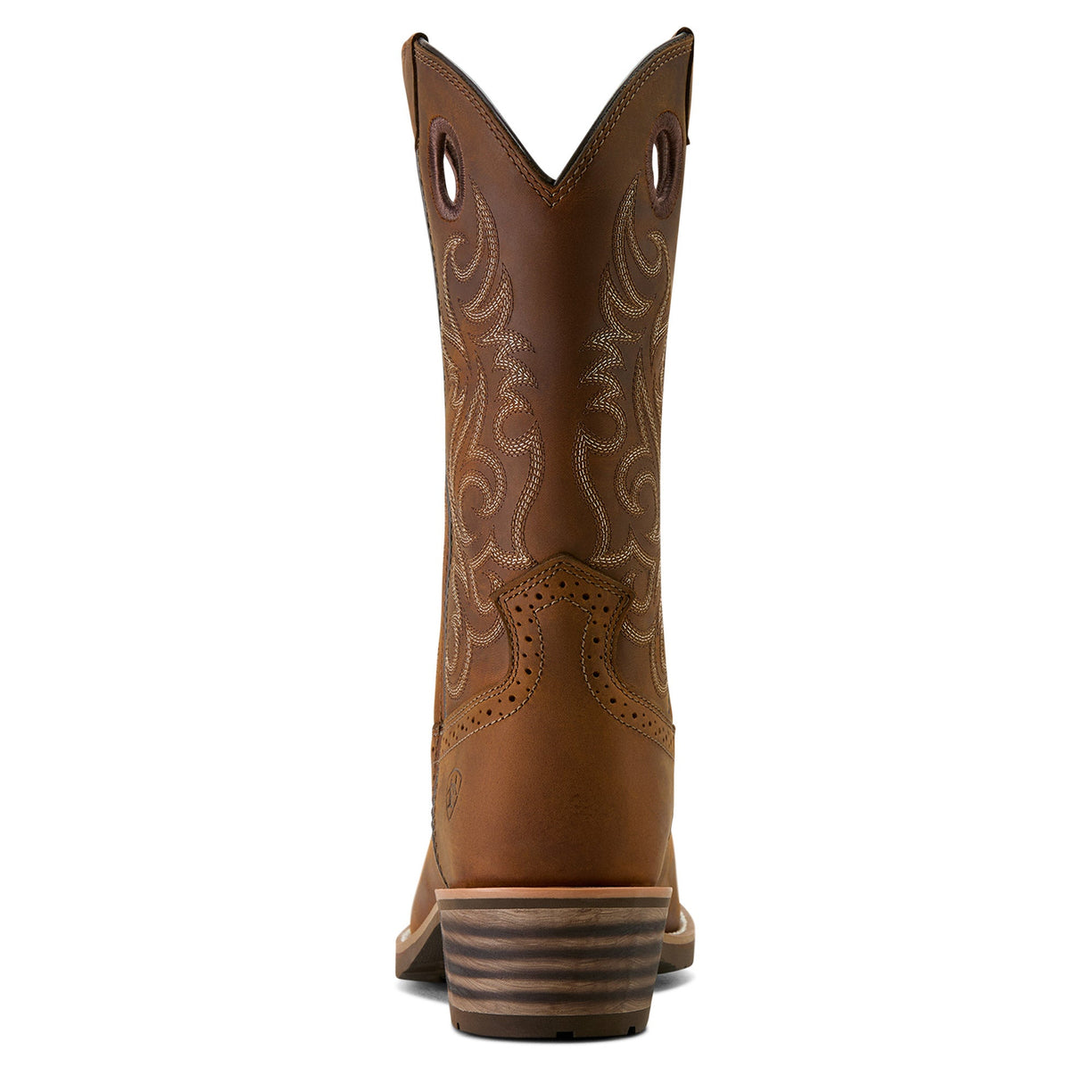 Brown cowboy boot with intricate stitching on a white background