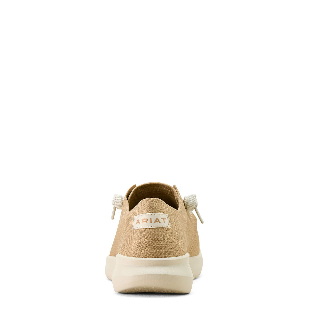 Tan sneaker with white sole on a white background