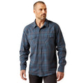 Man wearing a blue plaid shirt on a white background