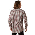 Man wearing a red and white checkered shirt on a white background