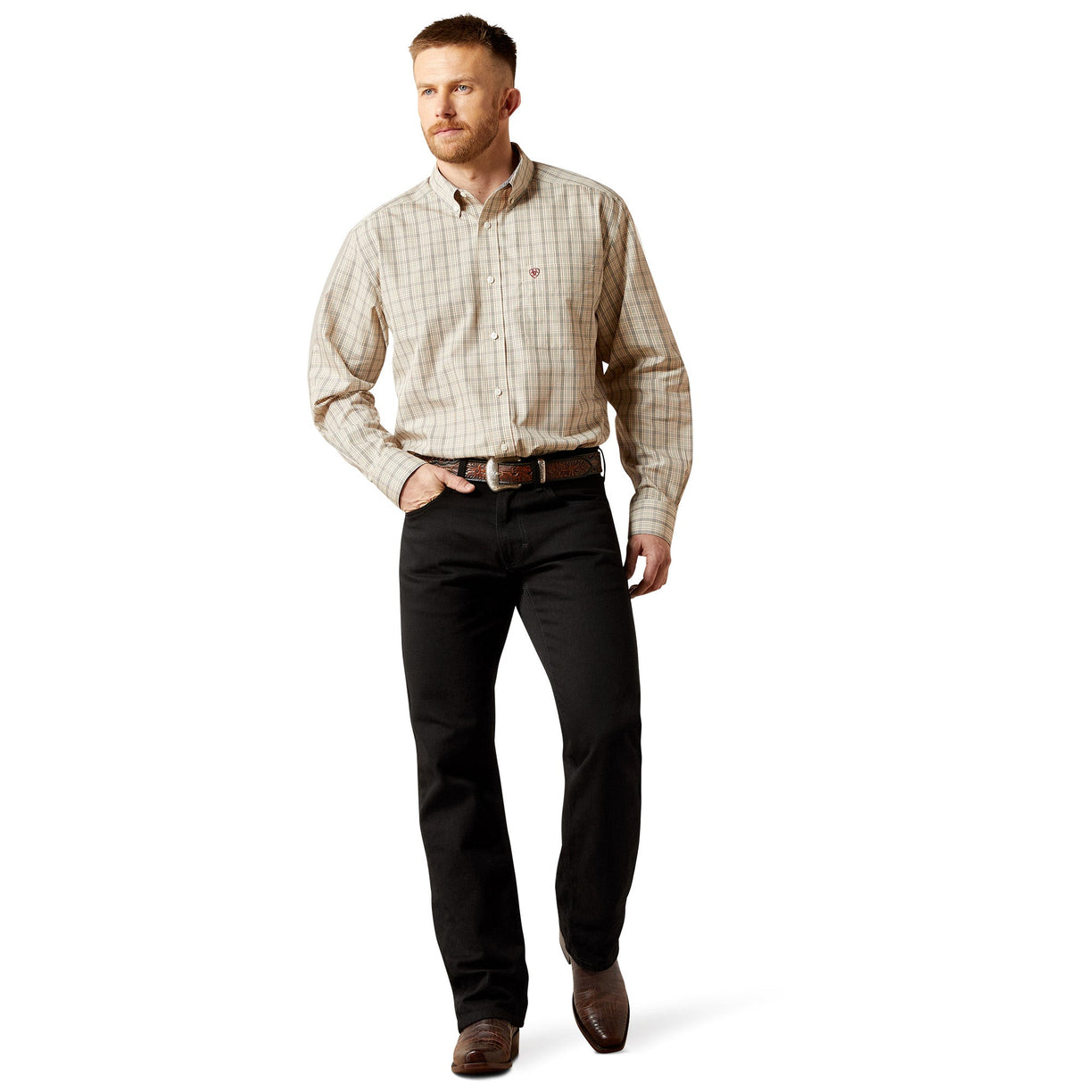 Man wearing a plaid shirt and black pants on a white background