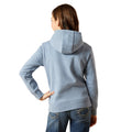 Person wearing a light blue hoodie from behind on a white background