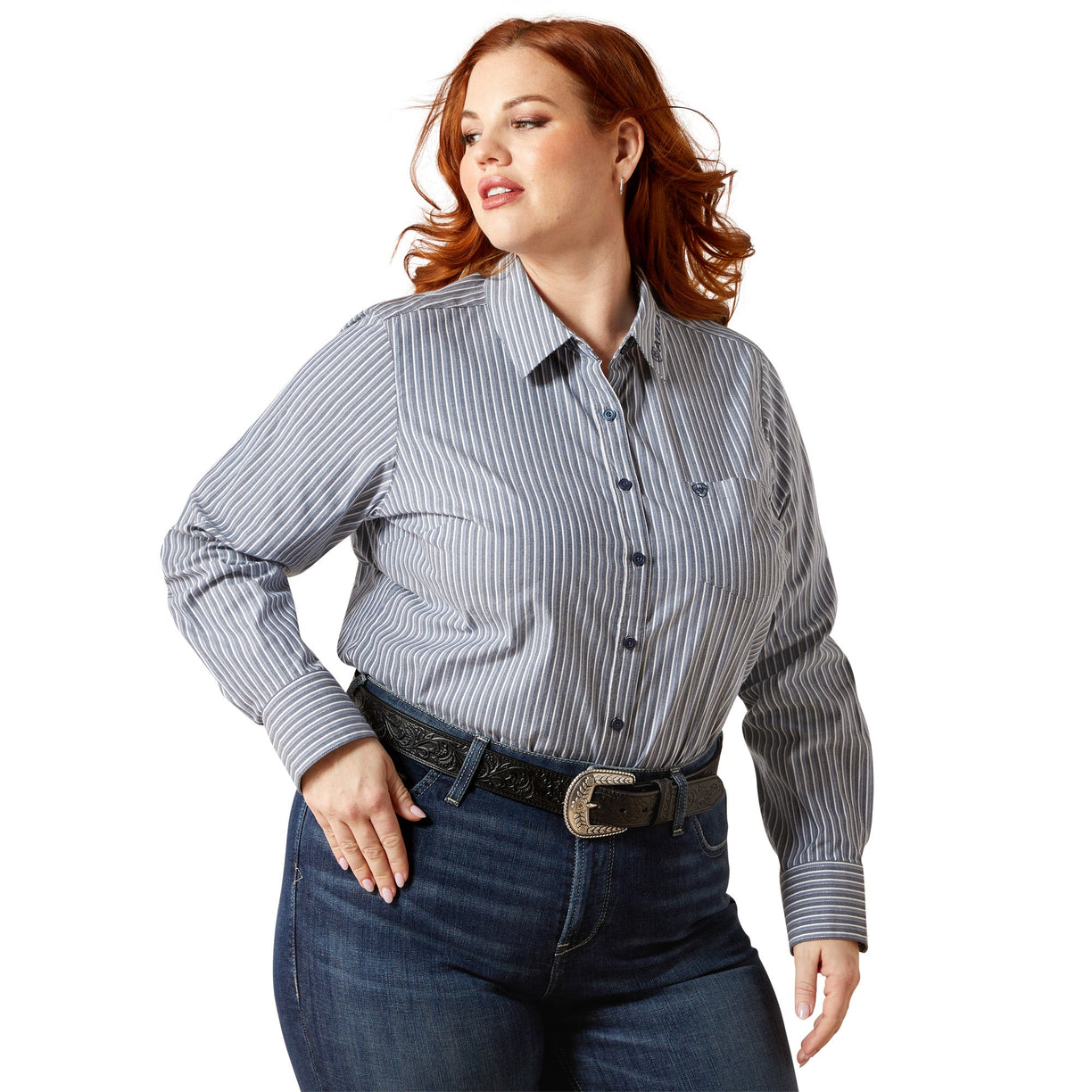 Woman wearing a striped shirt and jeans on a white background