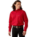 Man wearing a red patterned shirt on a white background