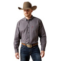 Man wearing a plaid shirt, jeans, and a cowboy hat on a white background