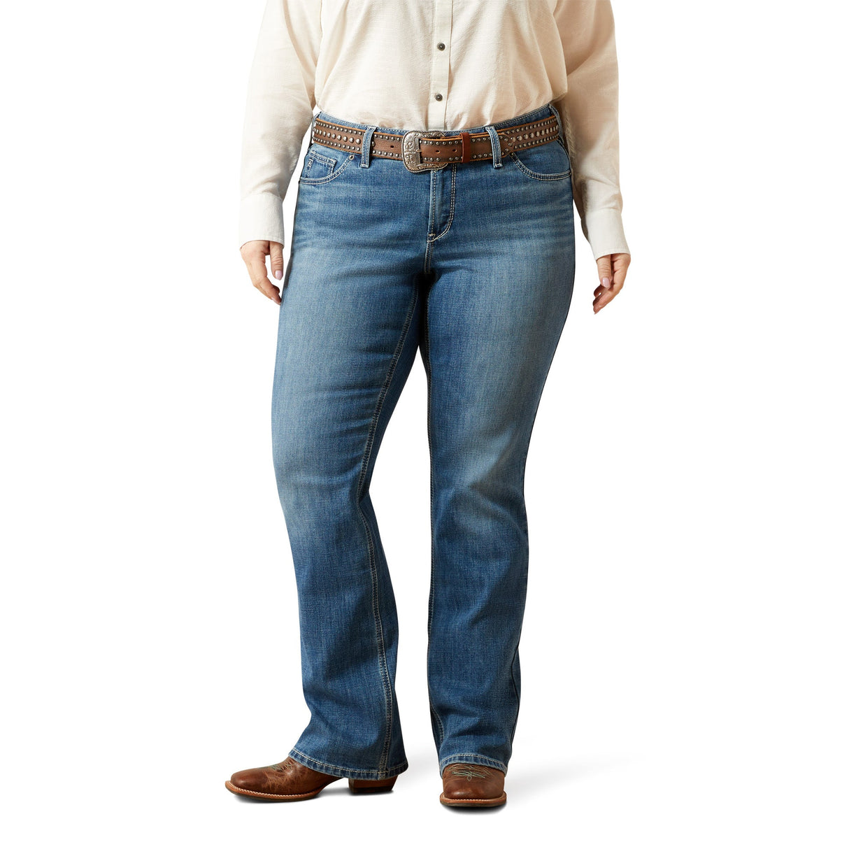 Plus size wearing blue jeans and a beige shirt on a white background
