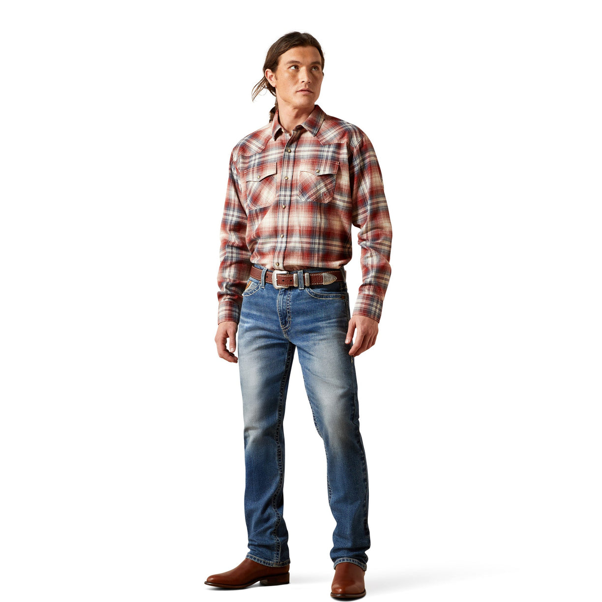 Man wearing a plaid shirt and jeans on a white background