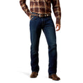 Person wearing blue jeans and a plaid shirt on a white background