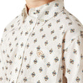White shirt with a patterned design on a white background