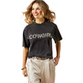 Woman wearing a black 'COWGIRL' t-shirt on a white background