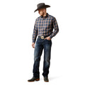 Man wearing a plaid shirt, jeans, and a cowboy hat on a white background