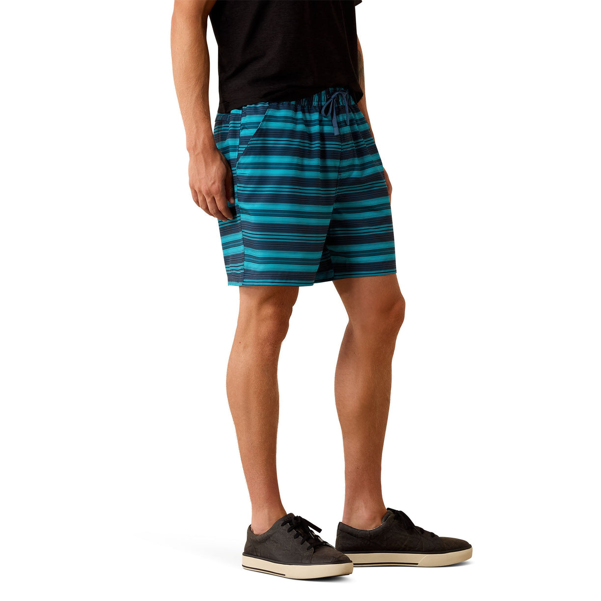 Person wearing blue striped shorts on a white background