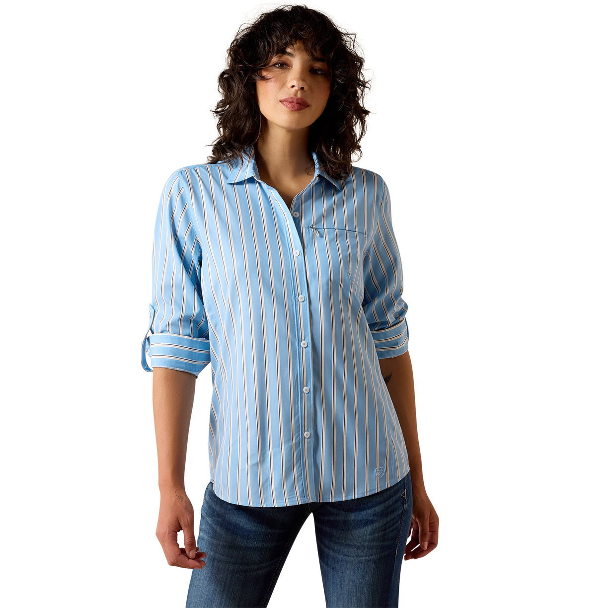 Woman wearing a light blue striped shirt and jeans on a white background